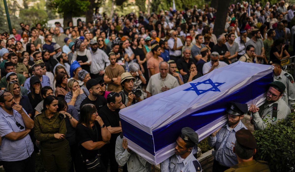 NextImg:Israeli rabbis work around the clock — even on the Sabbath — to count the dead from Hamas attack