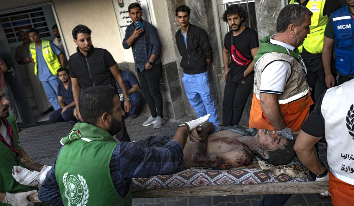 NextImg:Packed Gaza hospitals warn that thousands could die as supplies run low and ground offensive looms