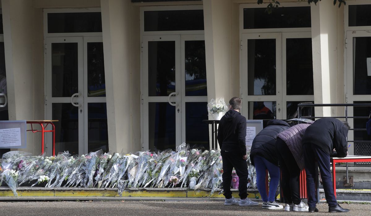 NextImg:French authorities say school where teacher was fatally stabbed last week evacuated over bomb alert