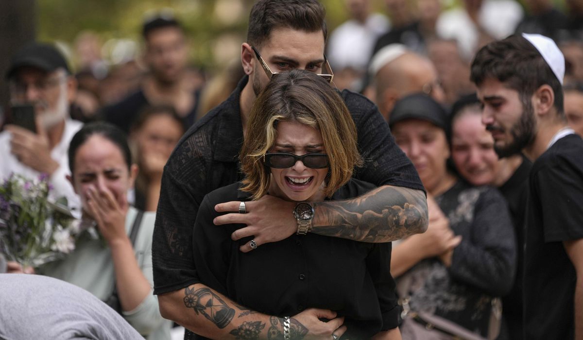 NextImg:The Israeli public finds itself in grief and shock, but many pledge allegiance to war effort