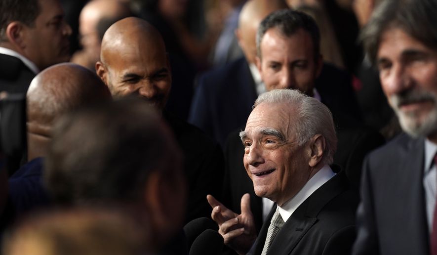 Martin Scorsese, director of co-writer of "Killers of the Flower Moon," works the press line at the Los Angeles premiere of the film, Monday, Oct. 16, 2023, at the Dolby Theater. (AP Photo/Chris Pizzello)