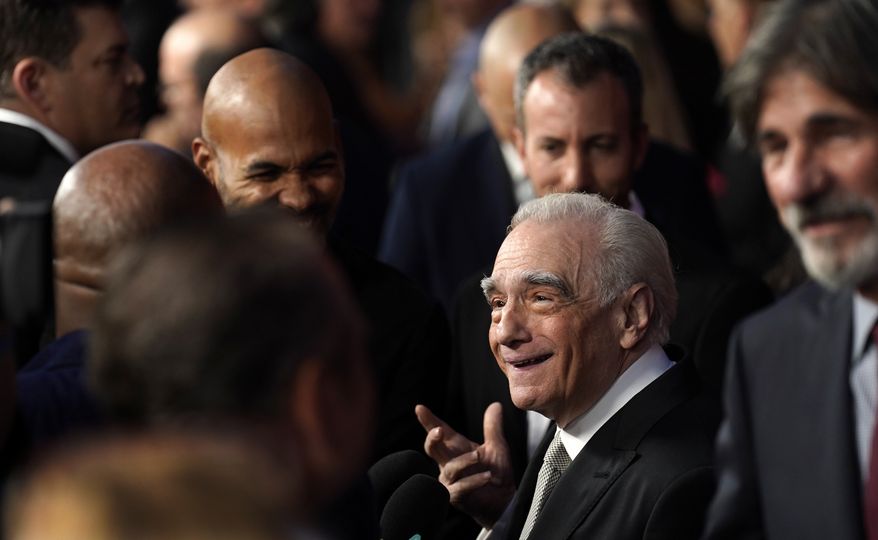 Martin Scorsese, director of co-writer of "Killers of the Flower Moon," works the press line at the Los Angeles premiere of the film, Monday, Oct. 16, 2023, at the Dolby Theater. (AP Photo/Chris Pizzello)