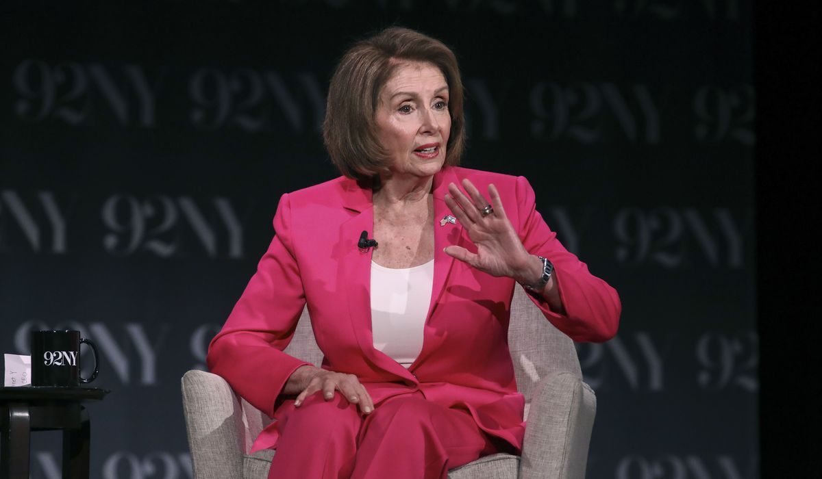 NextImg:Pelosi suggests Biden should rethink decision to stay in race