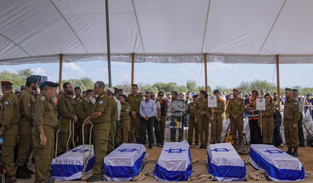 NextImg:Hundreds mourn as Israeli family of 5 that was slain together is laid to rest