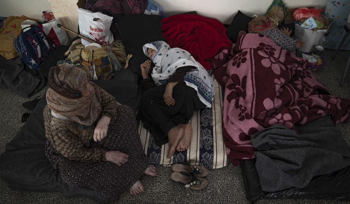 NextImg:Live updates | Aid for Gaza stuck at border as Israeli siege persists and Biden plans trip to region