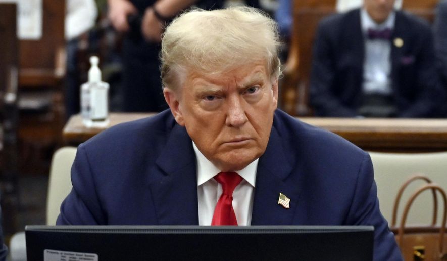 Former President Donald Trump sits during his civil fraud trial at the State Supreme Court building in New York, Oct. 4, 2023. Trump is set to be questioned under oath as part of lawsuits from two former FBI employees who provoked the former president&#x27;s outrage after sending each other pejorative text messages about him.(Angela Weiss/Pool via AP)