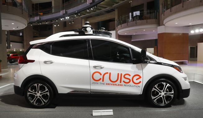 Cruise AV, General Motors&#x27; autonomous electric Bolt EV is displayed in Detroit on Jan. 16, 2019. U.S. regulators are investigating General Motors&#x27; Cruise autonomous vehicle division after receiving reports of incidents where vehicles may not have used proper caution around pedestrians on roadways. (AP Photo/Paul Sancya, File)