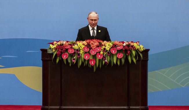 Russian President Vladimir Putin delivers a speech during the Belt and Road Forum at the Great Hall of the People in Beijing, Wednesday, Oct. 18, 2023. (AP Photo/Louise Delmotte)