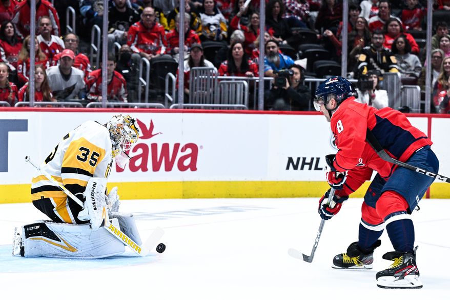 Washington Capitals left wing Alex Ovechkin (8) takes a shot during the second period against the Pittsburgh Penguins at Capital One Arena, Washington, D.C., October 13, 2023. (Photo by Brian Murphy for the Washington Times)