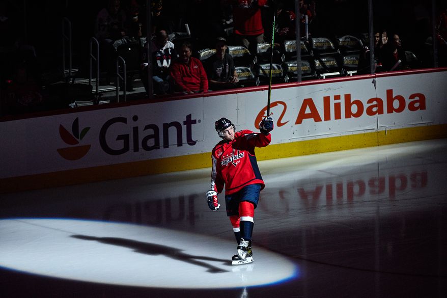 Washington Capitals right wing T.J. Oshie (77) salutes the crowd during pregame introductions before the team’s season opener against the Pittsburgh Penguins at Capital One Arena, Washington, D.C., October 13, 2023. (Photo by Brian Murphy for the Washington Times)