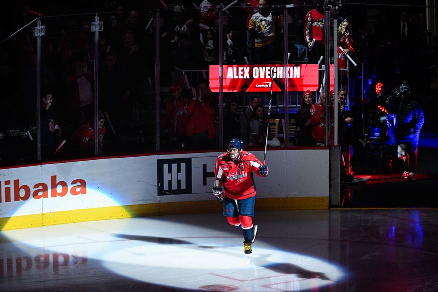 Washington Capitals left wing Alex Ovechkin (8) salutes the crowd during pregame introductions before the team’s season opener against the Pittsburgh Penguins at Capital One Arena, Washington, D.C., October 13, 2023. (Photo by Brian Murphy for the Washington Times)