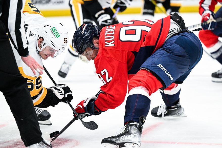 Washington Capitals center Evgeny Kuznetsov (92) takes a face-off against the Pittsburgh Penguins at Capital One Arena, Washington, D.C., October 13, 2023. (Photo by Brian Murphy for the Washington Times)