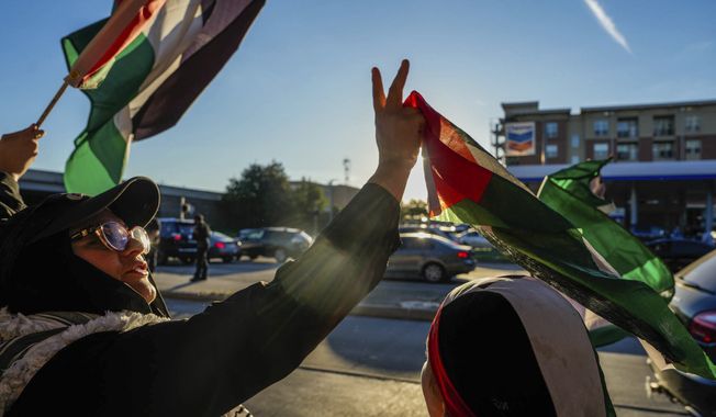 Protesters gather outside of the Israeli Embassy in support of the Palestinian people in Gaza on Wednesday, Oct. 18, 2023, in Houston./Houston Chronicle via AP) **FILE**