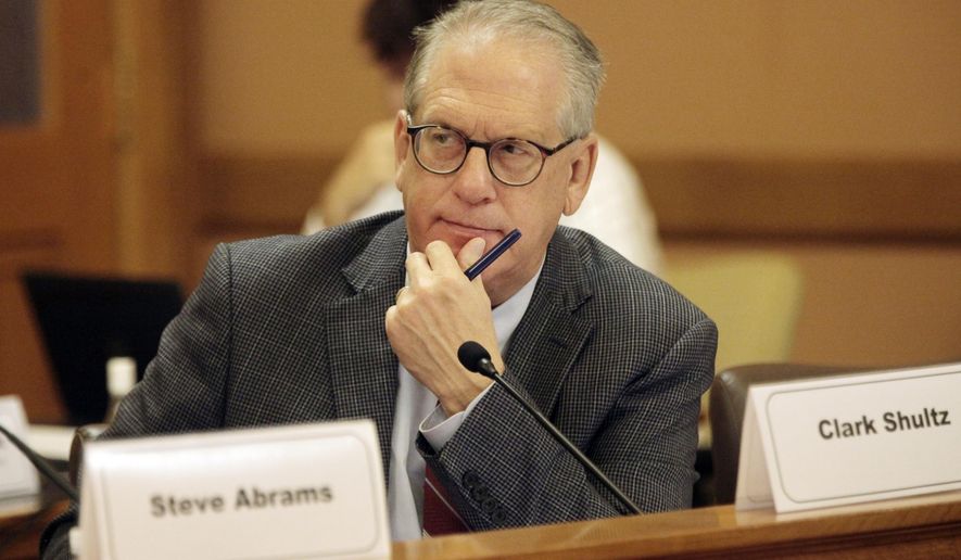 Former Kansas state Rep. Clark Shultz follows a discussion of a proposal to give Kansas legislators a pay increase of $28,000 starting in 2025, Thursday, Oct. 19, 2023, at the Statehouse in Topeka, Kan. The proposal would increase rank-and-file lawmakers' pay by 93% in hopes of getting a more diverse Legislature. (AP Photo/John Hanna)