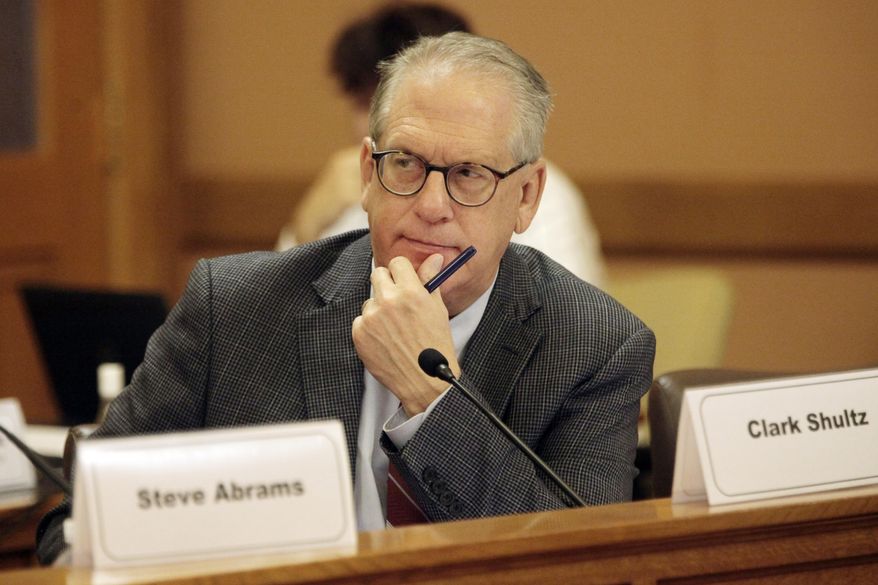 Former Kansas state Rep. Clark Shultz follows a discussion of a proposal to give Kansas legislators a pay increase of $28,000 starting in 2025, Thursday, Oct. 19, 2023, at the Statehouse in Topeka, Kan. The proposal would increase rank-and-file lawmakers' pay by 93% in hopes of getting a more diverse Legislature. (AP Photo/John Hanna)