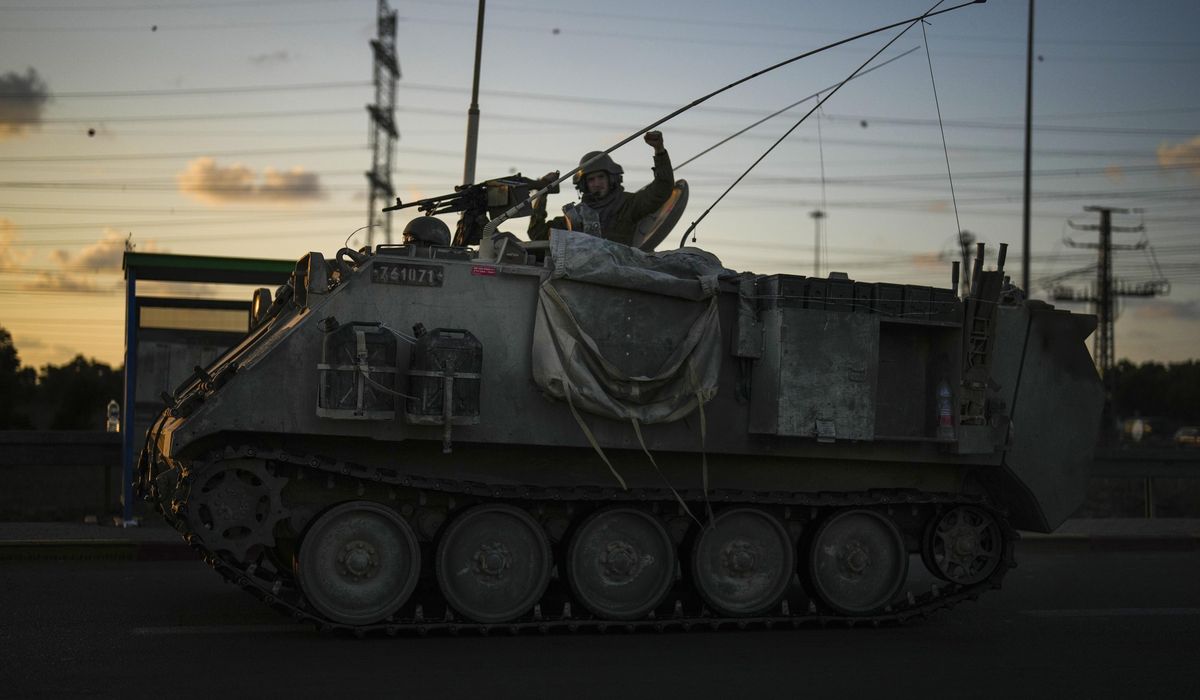 NextImg:Israel pounds Gaza, evacuates town near Lebanon ahead of expected ground offensive against Hamas