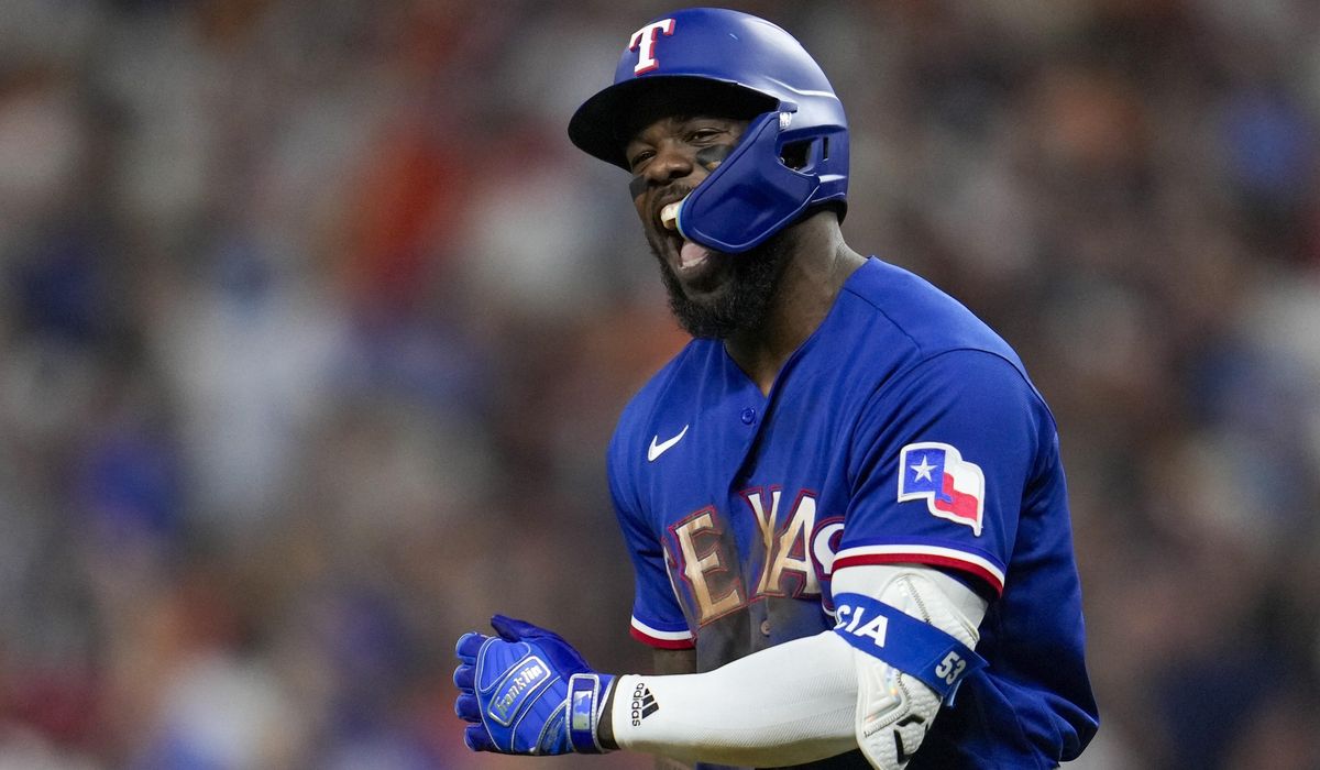 NextImg:Garcia, Seager slug Rangers to first World Series trip since 2011 in 11-4 Game 7 rout of Astros