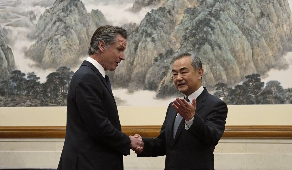 NextImg:California Gov. Gavin Newsom has rare friendly exchange with China’s senior diplomat Wang Yi