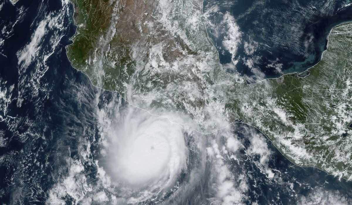 NextImg:Hurricane Otis weakens to Category 4 storm while heavy rains and flash floods batter southern Mexico