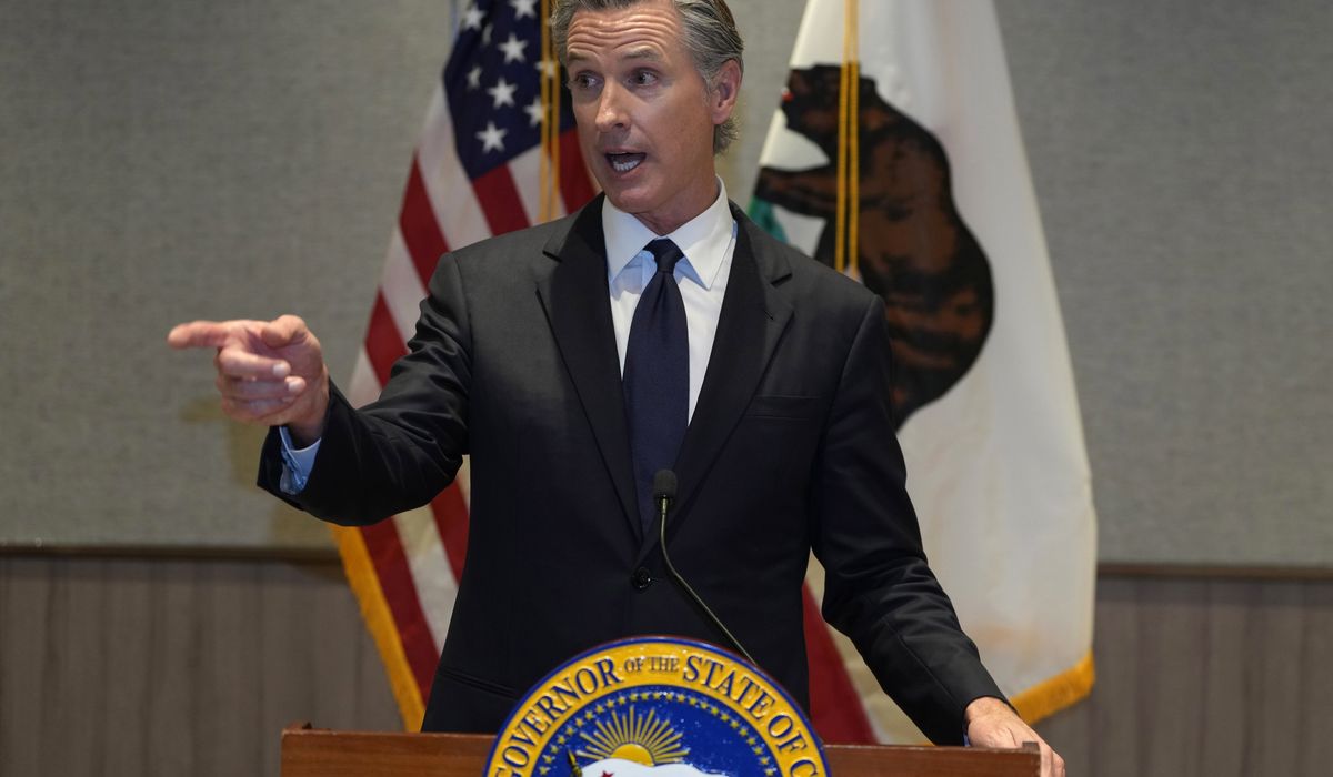 NextImg:Gavin Newsom takes swipe at Speaker Mike Johnson for mourning Maine mass shooting
