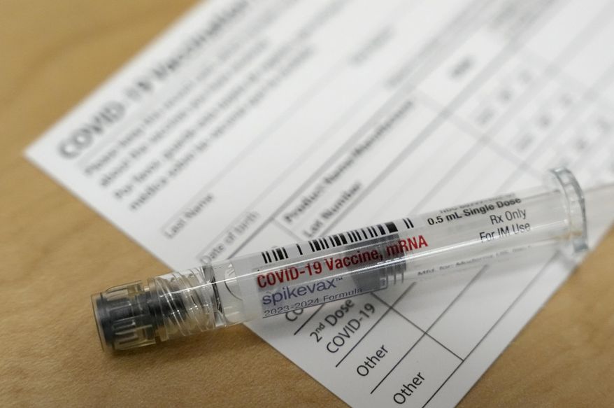 A Moderna Spikevax COVID-19 vaccine is seen at a drugstore in Cypress, Texas, Sept. 20, 2023. More than a month after federal officials recommended a new version of the COVID-19 vaccines, 7% of U.S. adults and 2% of children have gotten a shot. The numbers — which one expert called “abysmal” — were presented Thursday, Oct. 26, at a meeting held by the U.S. Centers for Disease Control and Prevention. (Melissa Phillip/Houston Chronicle via AP, File)
