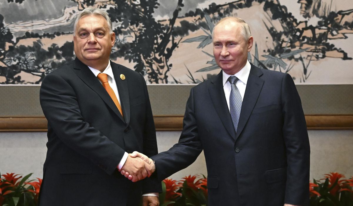 NextImg:Fresh off a hearty Putin handshake, Orban heads into an EU summit on Ukraine