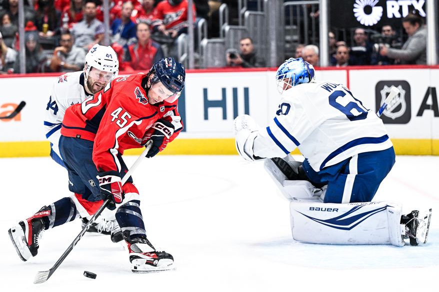 Washington Capitals right wing Matthew Phillips (45) gains possession of the puck against the Toronto Maple Leafs at Capital One Arena, Washington, D.C., October 24, 2023. (Photo by Brian Murphy for the Washington Times)
