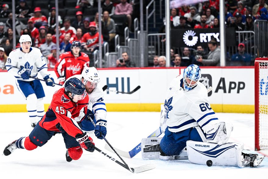 Washington Capitals right wing Matthew Phillips (45) has his shot saved by Toronto Maple Leafs goalie Joseph Woll (60) at Capital One Arena, Washington, D.C., October 24, 2023. (Photo by Brian Murphy for the Washington Times)