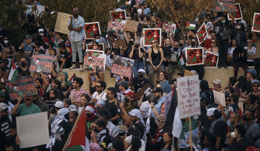 Protesters gather during a pro-Palestinian demonstration demanding a cease fire, Saturday, Oct. 28, 2023, in New York. (AP Photo/Andres Kudacki)