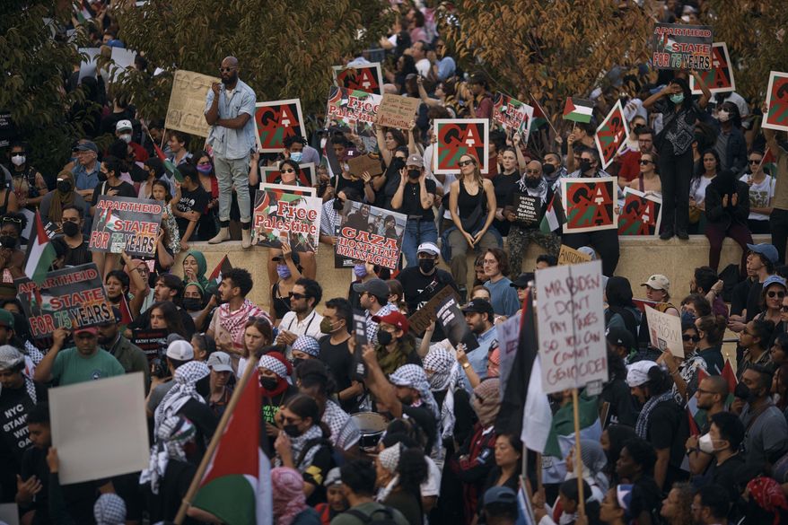 Protesters gather during a pro-Palestinian demonstration demanding a cease fire, Saturday, Oct. 28, 2023, in New York. (AP Photo/Andres Kudacki)