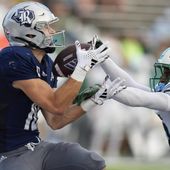 Rice wide receiver Luke McCaffrey, left, catches a pass for a touchdown as Tulane safety Kam Pedescleaux defends during the second half of an NCAA college football game, Saturday, Oct. 28, 2023, in Houston. (AP Photo/Eric Christian Smith)