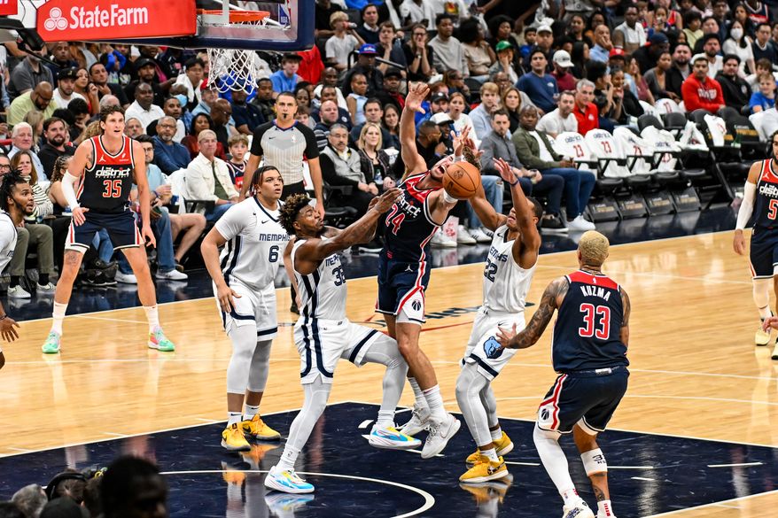 Washington, D.C.: Forward Corey Kispert (24) attempts to draw foul call. The Washington Wizards defeat the Memphis Grizzlies in their home season opener from the Capital One Arena in Washington, D.C. on October 28th, 2023. (Photo: Joe Glorioso | Washington Times Sports)