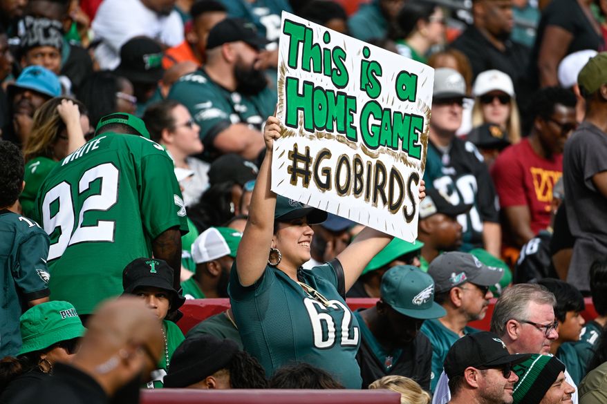 A Philadelphia Eagles fan holds up a sign as the Washington Commanders host the Philadelphia Eagles at FedEx Field, Landover, Md., October 29, 2023. (Photo by Brian Murphy for the Washington Times)