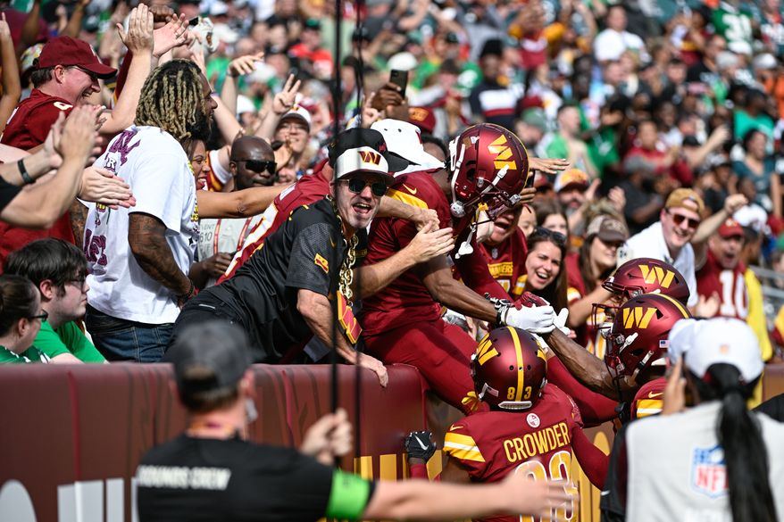 Washington Commanders receiver Jahan Dotson (1) celebrates his 21-yard touchdown reception during the second quarter against the Philadelphia Eagles at FedEx Field, Landover, Md., October 29, 2023. (Photo by Brian Murphy for the Washington Times)