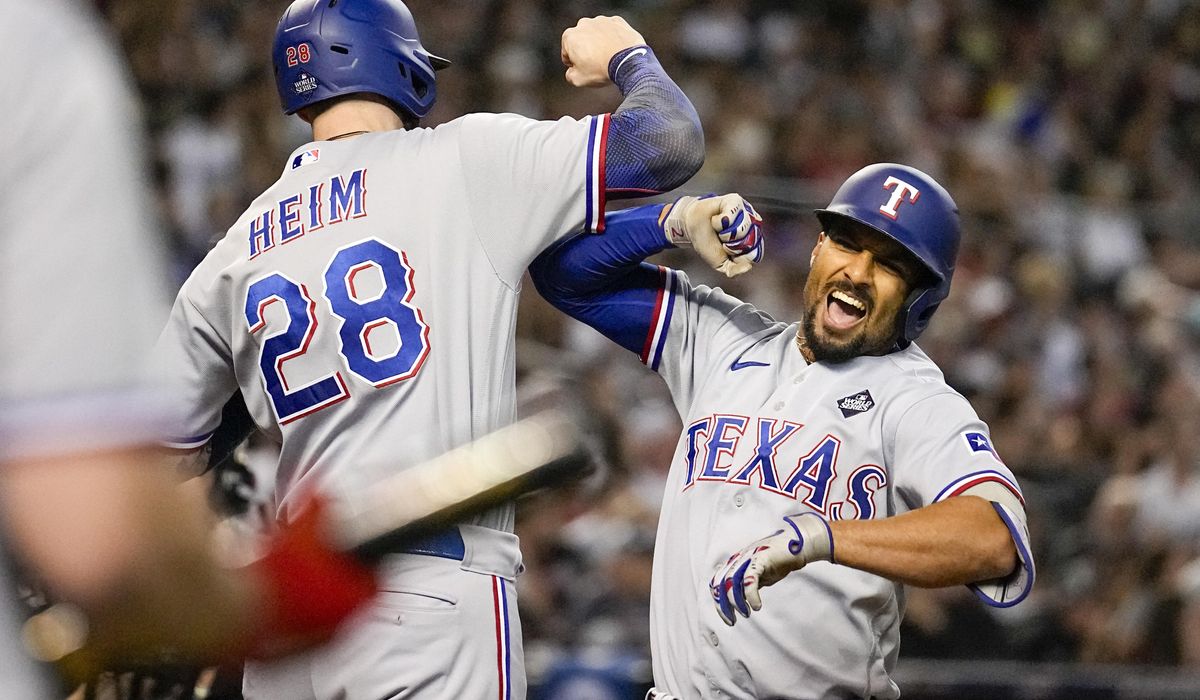 NextImg:Semien’s 5 RBIs, Seager’s home run lead Rangers over Diamondbacks 11-7 for 3-1 World Series lead
