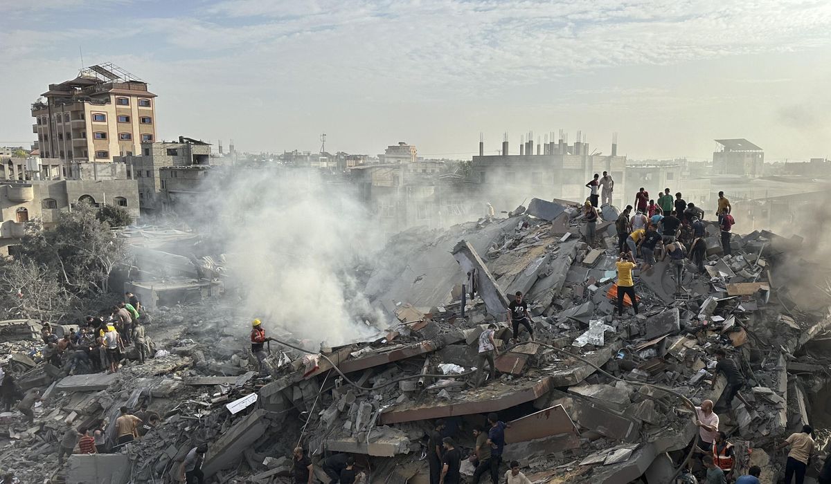 NextImg:Gaza’s communications cut again for hours, as dozens of foreigners and wounded prepare to exit