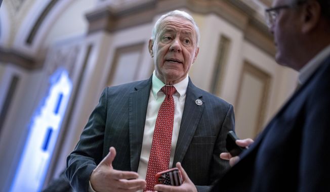 Rep. Ken Buck, R-Colo., a member of the conservative House Freedom Caucus, stops to speak with a reporter, Dec. 2, 2022, at the U.S. Capitol in Washington. Buck, a conservative Republican who represents much of Colorado&#x27;s rural eastern plains, announced Wednesday, Nov. 1, 2023, that he would not seek a sixth term in Congress, citing many in his party who refuse to accept the results of the 2020 presidential election and to condemn the Jan. 6, 2021, attack on the Capitol. (AP Photo/J. Scott Applewhite, File)