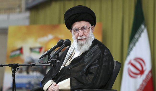 In this photo released by the official website of the office of the Iranian supreme leader, Supreme Leader Ayatollah Ali Khamenei attends a meeting with a group of students in Tehran, Iran, Wednesday, Nov. 1, 2023. Khamenei called on Muslim nations to stop exporting food and oil to Israel over its airstrikes and military offensive in the Gaza Strip. (Office of the Iranian Supreme Leader via AP) **FILE**