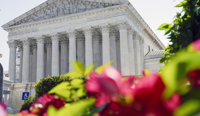 U.S. Supreme Court is seen on July 13, 2023, in Washington. In arguments on Nov. 1, Supreme Court justices will weigh a California man&#x27;s attempt to trademark a phrase mocking former President Donald Trump as &quot;too small.&quot;(AP Photo/Mariam Zuhaib, File)