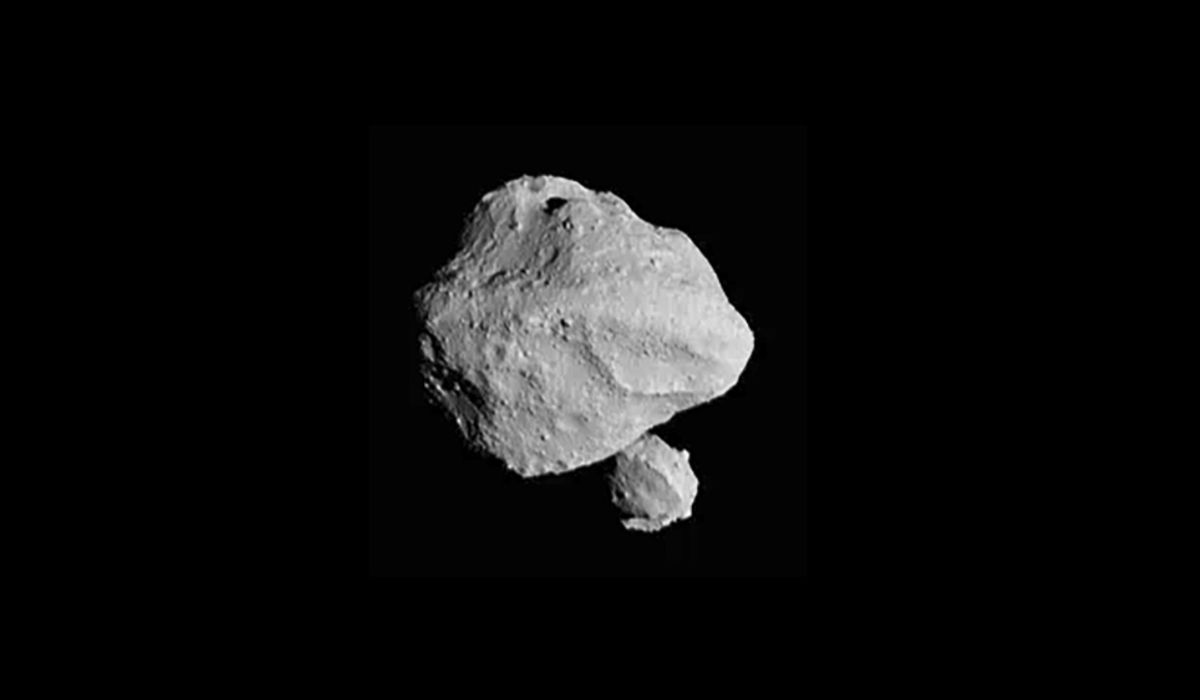 NextImg:NASA spacecraft doing a flyby finds two asteroids in one