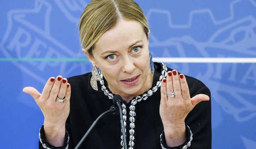 Italy's Premier Giorgia Meloni meets the media following a cabinet meeting in Rome Friday, Nov. 3, 2023. (Roberto Monaldo/LaPresse via AP)