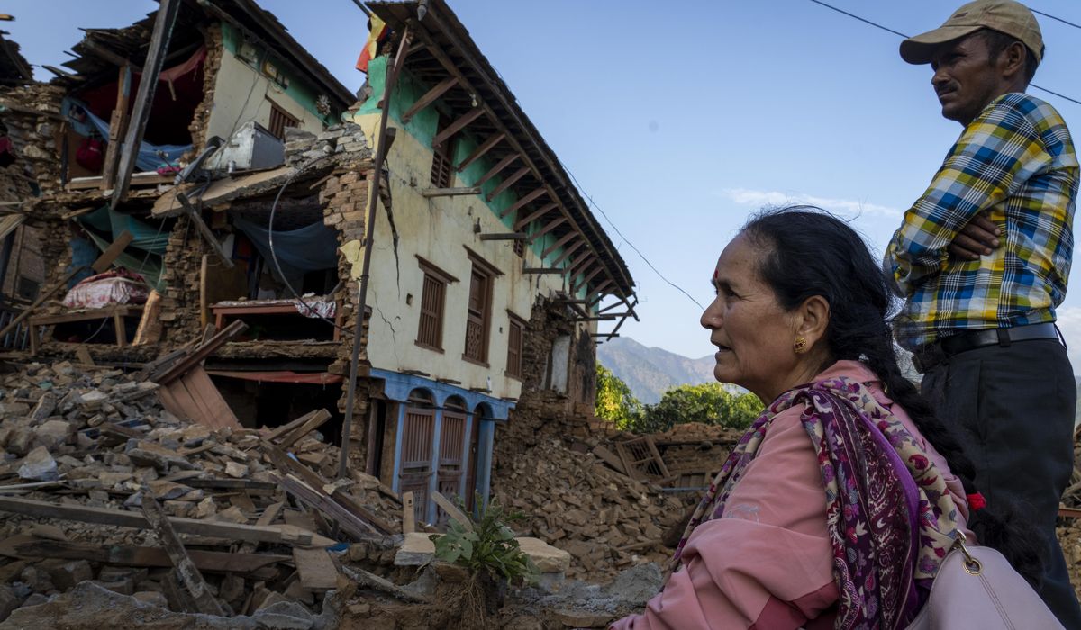 NextImg:Nepal villagers cremate loved ones who perished in earthquake that shook its northwest, killing 157