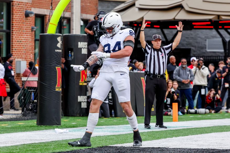 Tight end Theo Johnson (84) celebrating a touchdown. The Penn State Nittany Lions defeated the Maryland Terrapins 51 - 15 at SECU Stadium in College Park, Maryland on Saturday, November 4, 2023. (Photo: Taylor McLaughlin / All-Pro Reels)