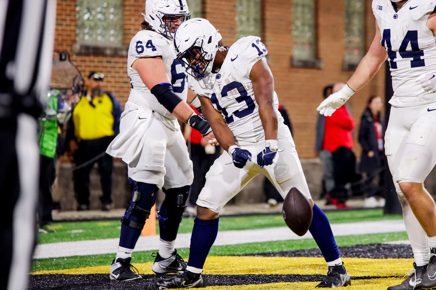 Running back Kaytron Allen (13) celebrating his touchdown with teammates. The Penn State Nittany Lions defeated the Maryland Terrapins 51 - 15 at SECU Stadium in College Park, Maryland on Saturday, November 4, 2023. (Photo: Taylor McLaughlin / All-Pro Reels)