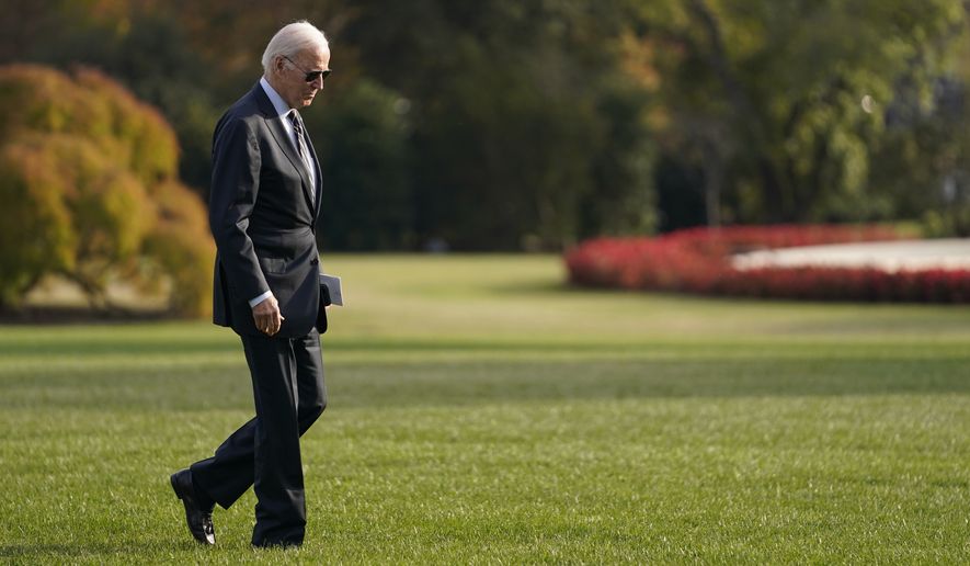 President Joe Biden walks after arriving on Marine One on the South Lawn of the White House, Monday, Nov. 6, 2023, in Washington. (AP Photo/Evan Vucci)
