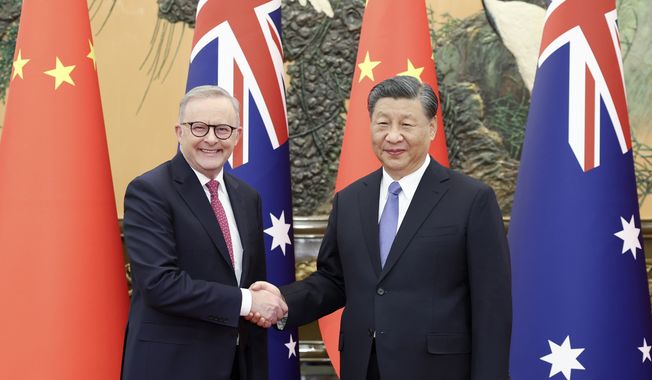 In this photo released by Xinhua News Agency, Australia&#x27;s Prime Minister Anthony Albanese, left, meets with China&#x27;s President Xi Jinping at the Great Hall of the People in Beijing, China, Monday, Nov. 6, 2023. Albanese is on a three-day visit to China (Ding Haitao/Xinhua via AP)