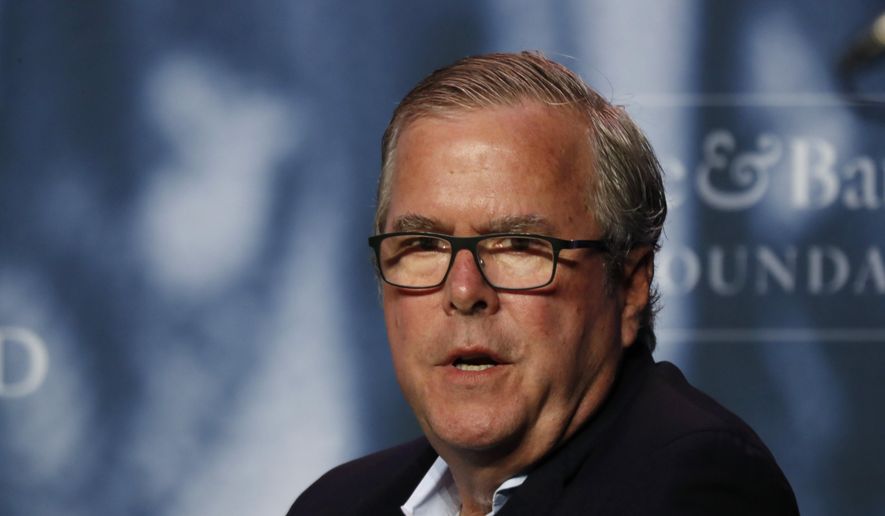Former Florida Gov. Jeb Bush takes part in a discussion at a George and Barbara Bush Distinguished Lecture, Sept. 27, 2019, at the University of New England in Biddeford, Maine. (AP Photo/Robert F. Bukaty, File)