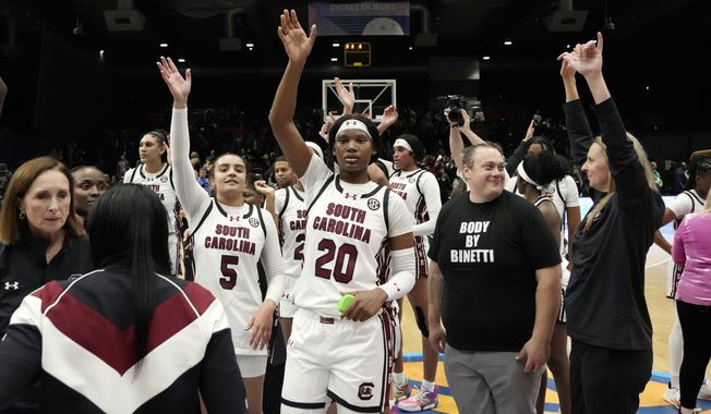 South Carolina players wave to fans after a win over Notre Dame in an NCAA college basketball game Monday, Nov. 6, 2023, in Paris. (AP Photo/Thibault Camus) **FILE**