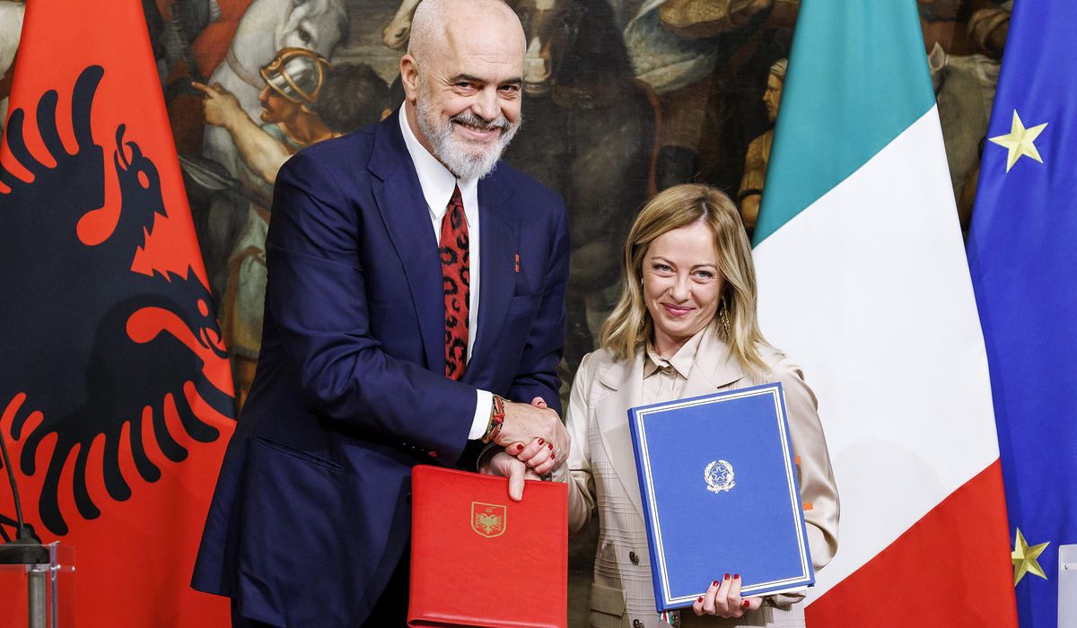 NextImg:Albania agrees to temporarily house migrants who reach Italy while their asylum bids are processed