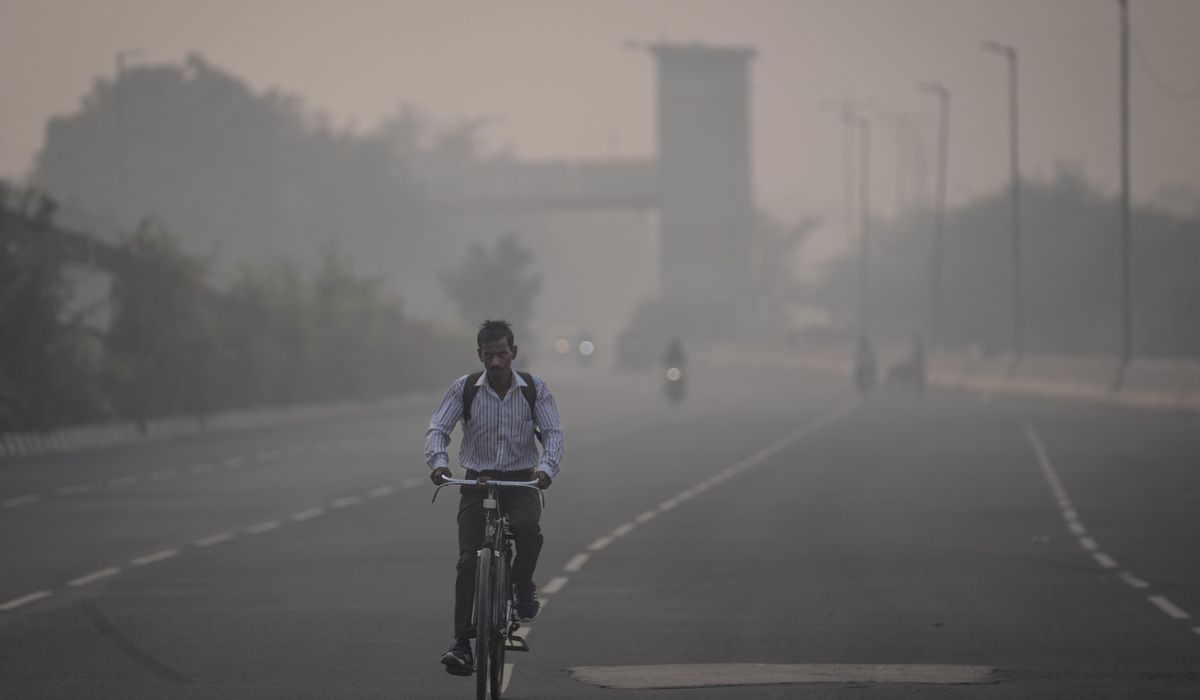 NextImg:Masks are back, construction banned and schools shut as toxic air engulfs New Delhi